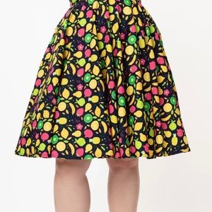 This is a 3X skirt with fruit print. The brand is Magnolia Place.